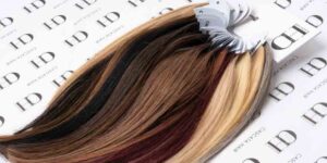 Cascata Hair Extensions - Colour ring with various shades of hair colours on display.
